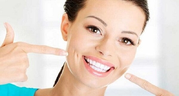 Причины появления зубного камня